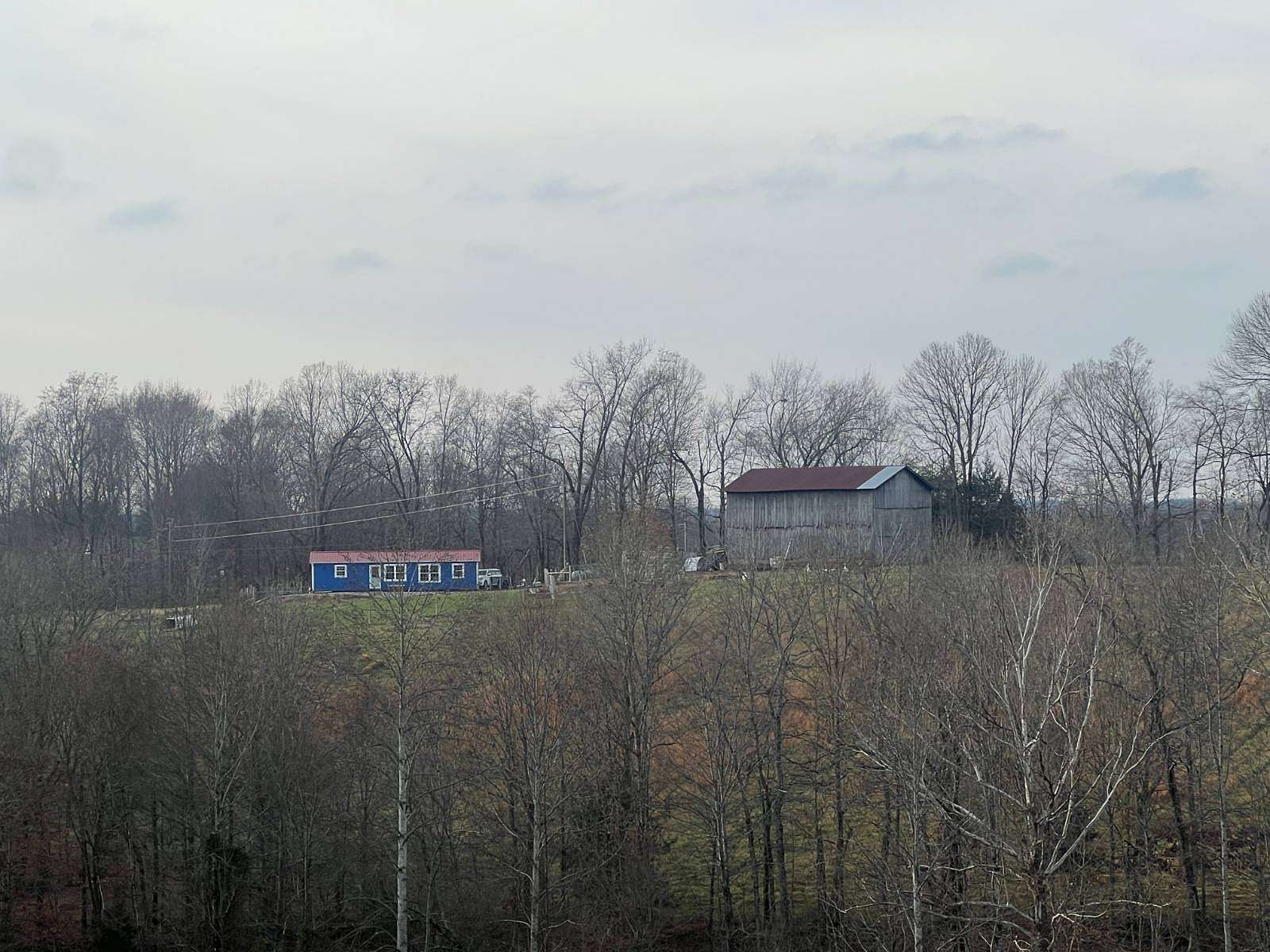 32 Acres of Land with Home for Sale in Albany, Kentucky