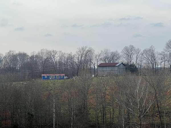 32 Acres of Land with Home for Sale in Albany, Kentucky