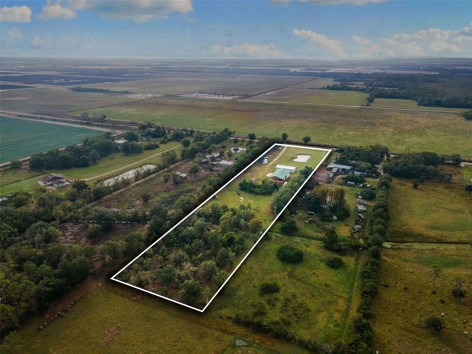 5 Acres of Residential Land with Home for Sale in Myakka City, Florida