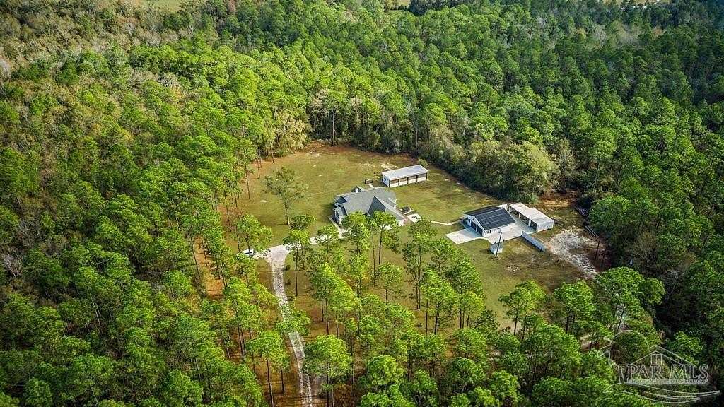 10 Acres of Land with Home for Sale in Molino, Florida