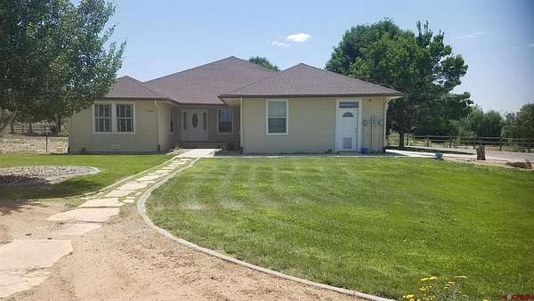 3.3 Acres of Residential Land with Home for Sale in Delta, Colorado