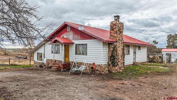 2 Acres of Residential Land with Home for Sale in Dolores, Colorado