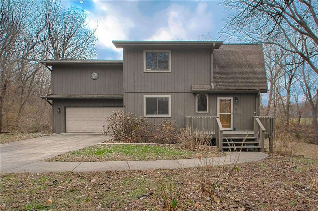 5.3 Acres of Residential Land with Home for Sale in Smithville, Missouri