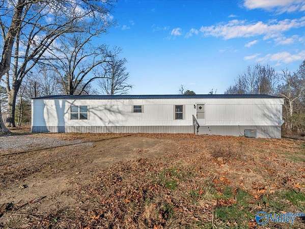 4.4 Acres of Residential Land with Home for Sale in Ider, Alabama