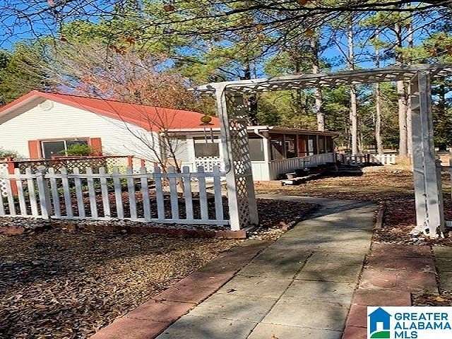 1.5 Acres of Residential Land with Home for Sale in Pell City, Alabama