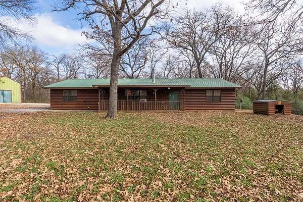 9.89 Acres of Residential Land with Home for Sale in Tecumseh, Oklahoma