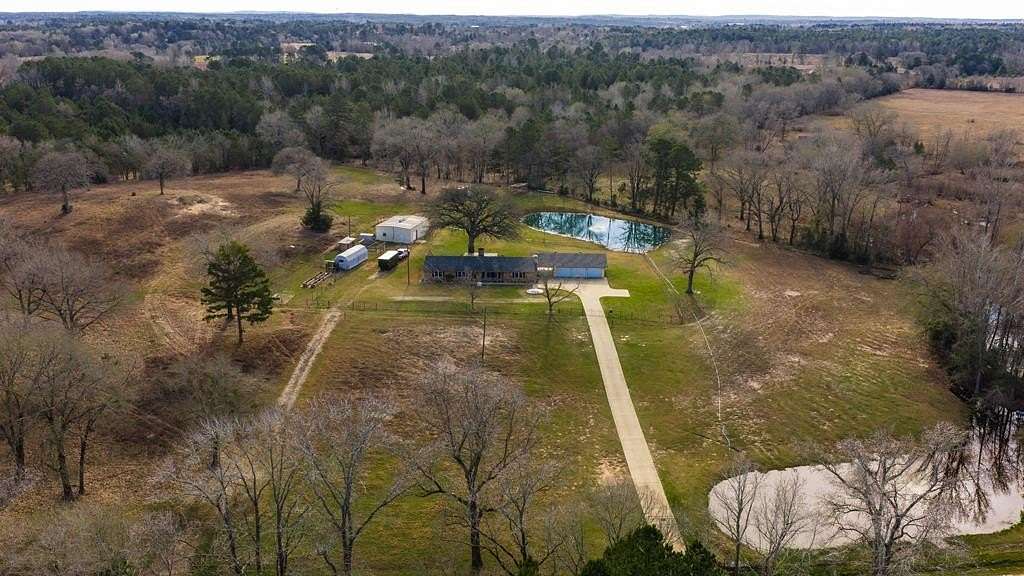 59 Acres of Recreational Land with Home for Sale in Palestine, Texas