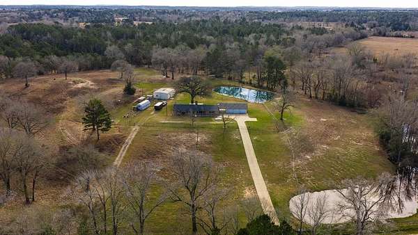 59 Acres of Recreational Land with Home for Sale in Palestine, Texas