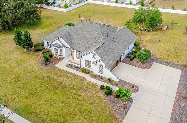 2.28 Acres of Residential Land with Home for Sale in Wildwood, Florida