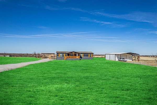 2.12 Acres of Residential Land with Home for Sale in Poolville, Texas