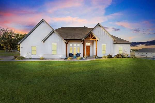 2 Acres of Residential Land with Home for Sale in Poolville, Texas