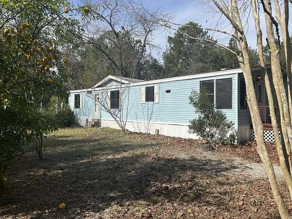 2 Acres of Residential Land with Home for Sale in Crawfordville, Florida