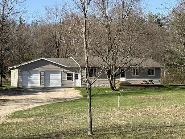 2.5 Acres of Land with Home for Sale in Remus, Michigan