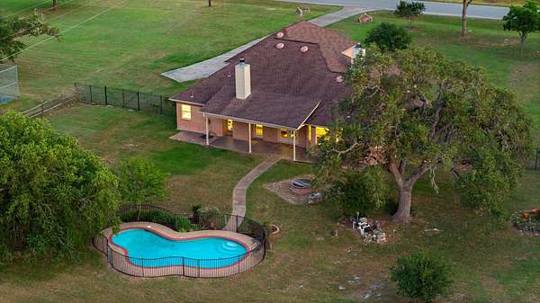 2 Acres of Residential Land with Home for Lease in Buda, Texas