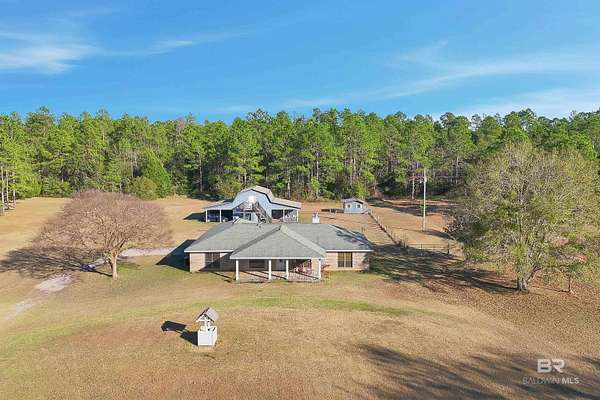 10.2 Acres of Land with Home for Sale in Elberta, Alabama