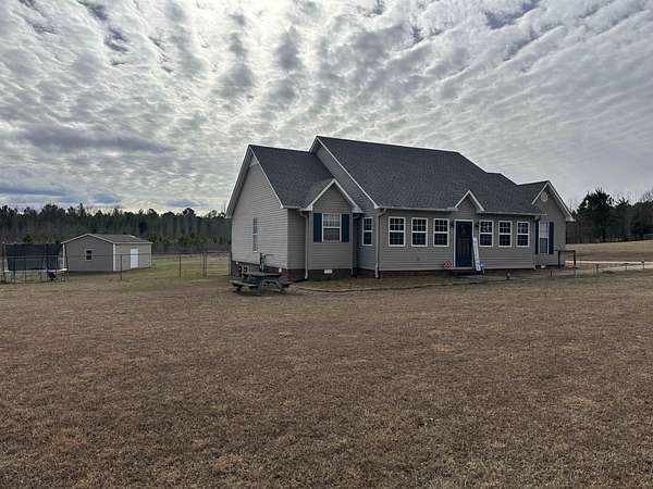 2 Acres of Residential Land with Home for Sale in Beech Bluff, Tennessee