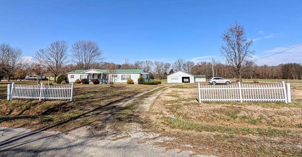 4 Acres of Residential Land with Home for Sale in Paris, Tennessee