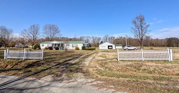 4 Acres of Residential Land with Home for Sale in Paris, Tennessee