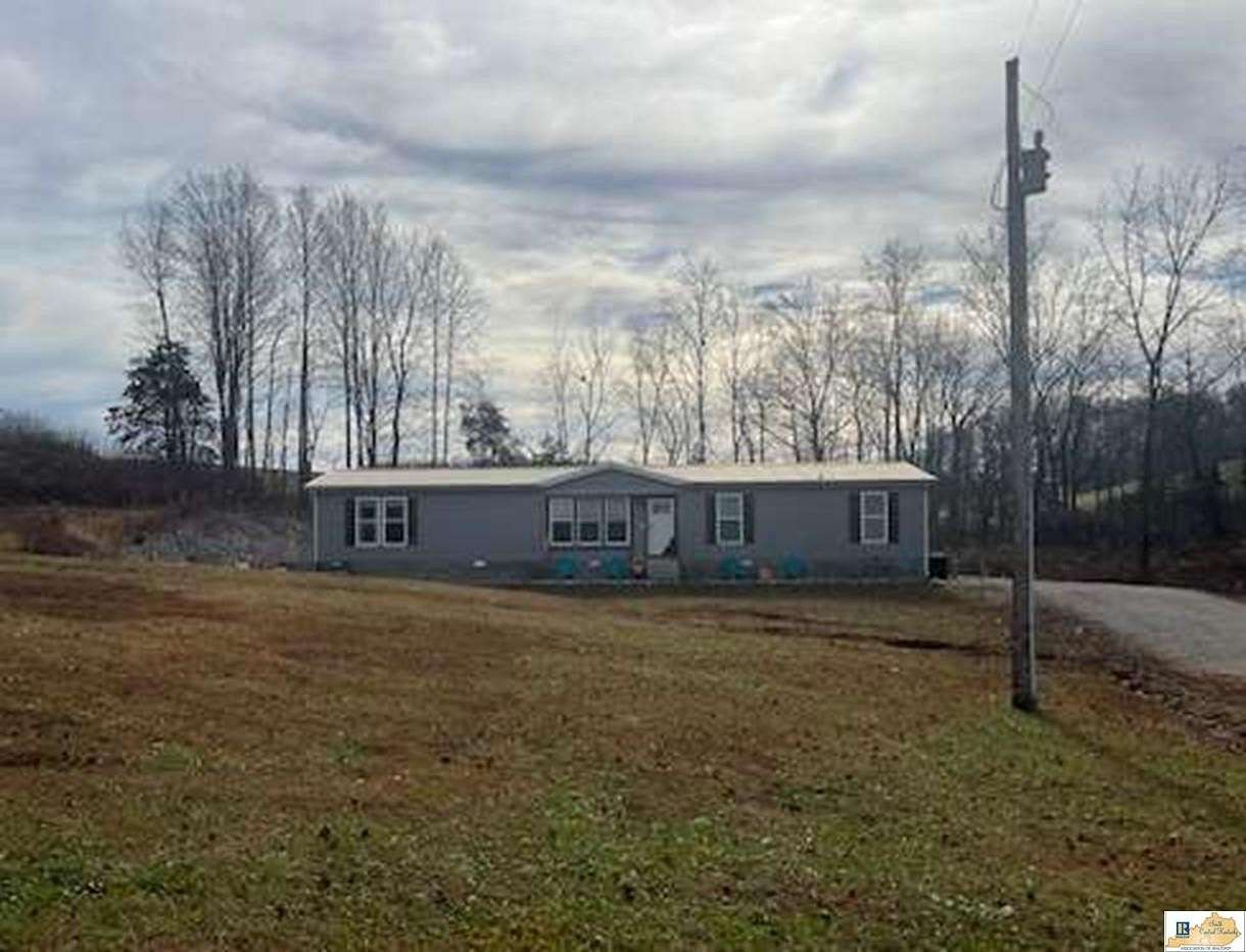 3.57 Acres of Land with Home for Sale in Tompkinsville, Kentucky