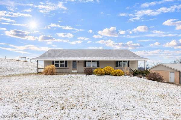 4.39 Acres of Residential Land with Home for Sale in Rayland, Ohio