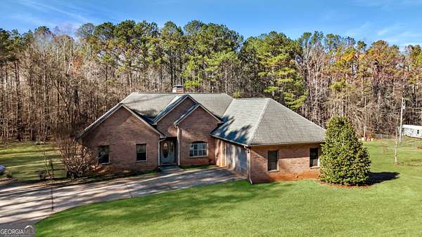 6.65 Acres of Residential Land with Home for Sale in Moreland, Georgia