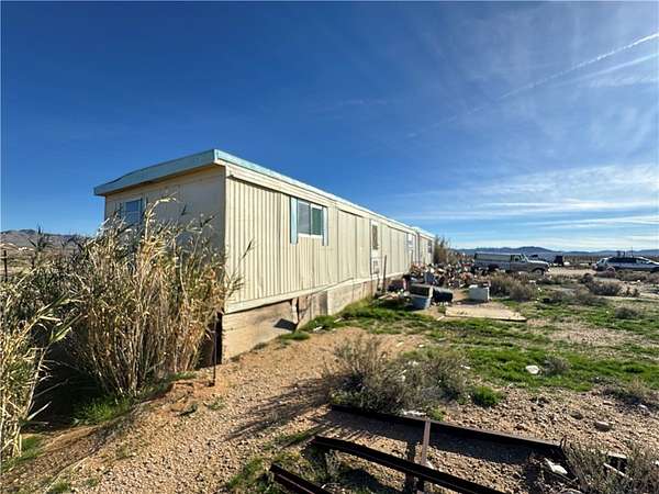 2.62 Acres of Land with Home for Sale in Golden Valley, Arizona