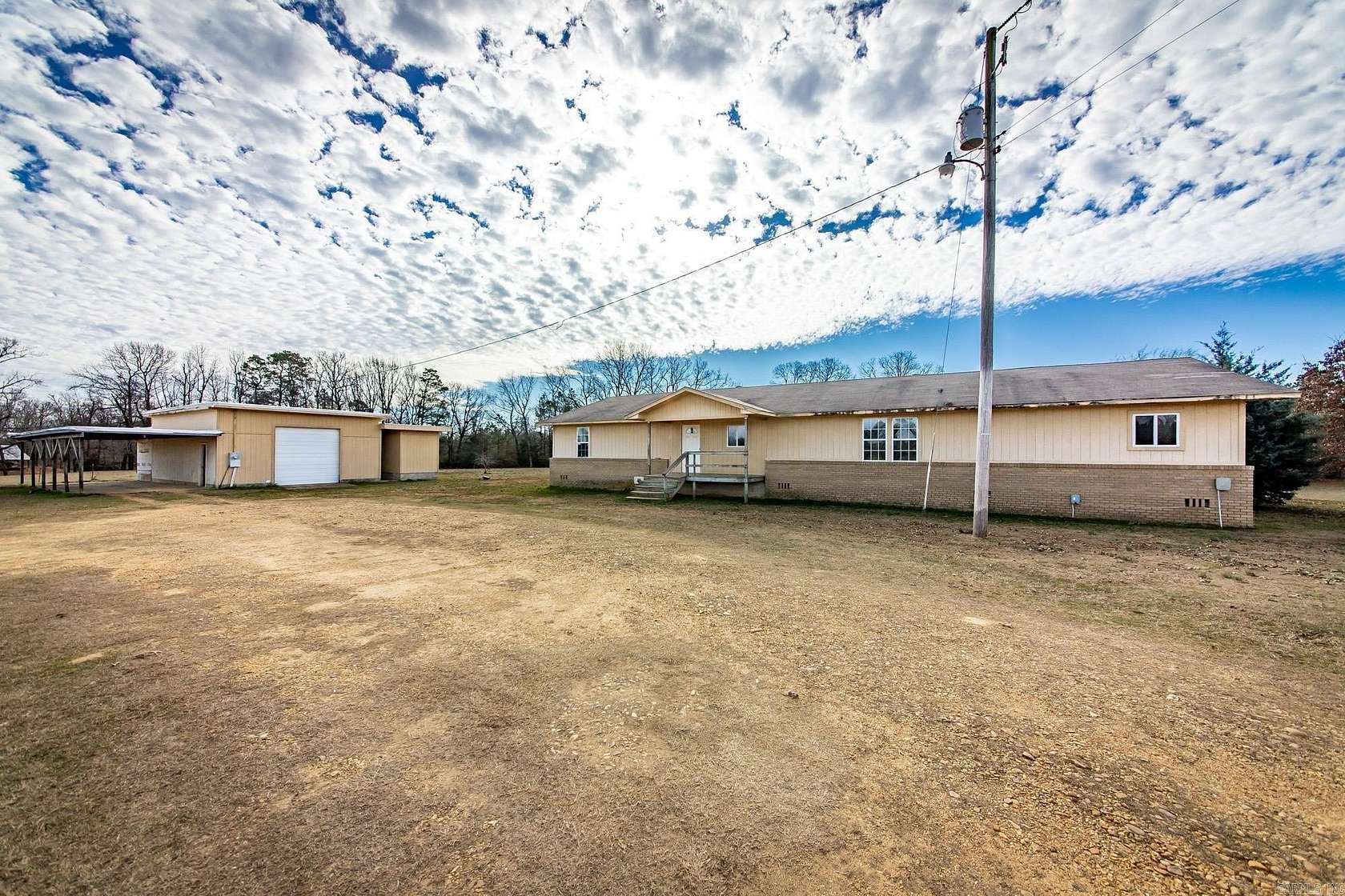 6.46 Acres of Land with Home for Sale in Leola, Arkansas