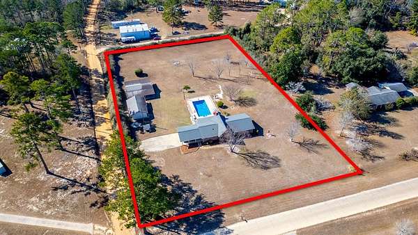 2.5 Acres of Residential Land with Home for Sale in Nicholls, Georgia