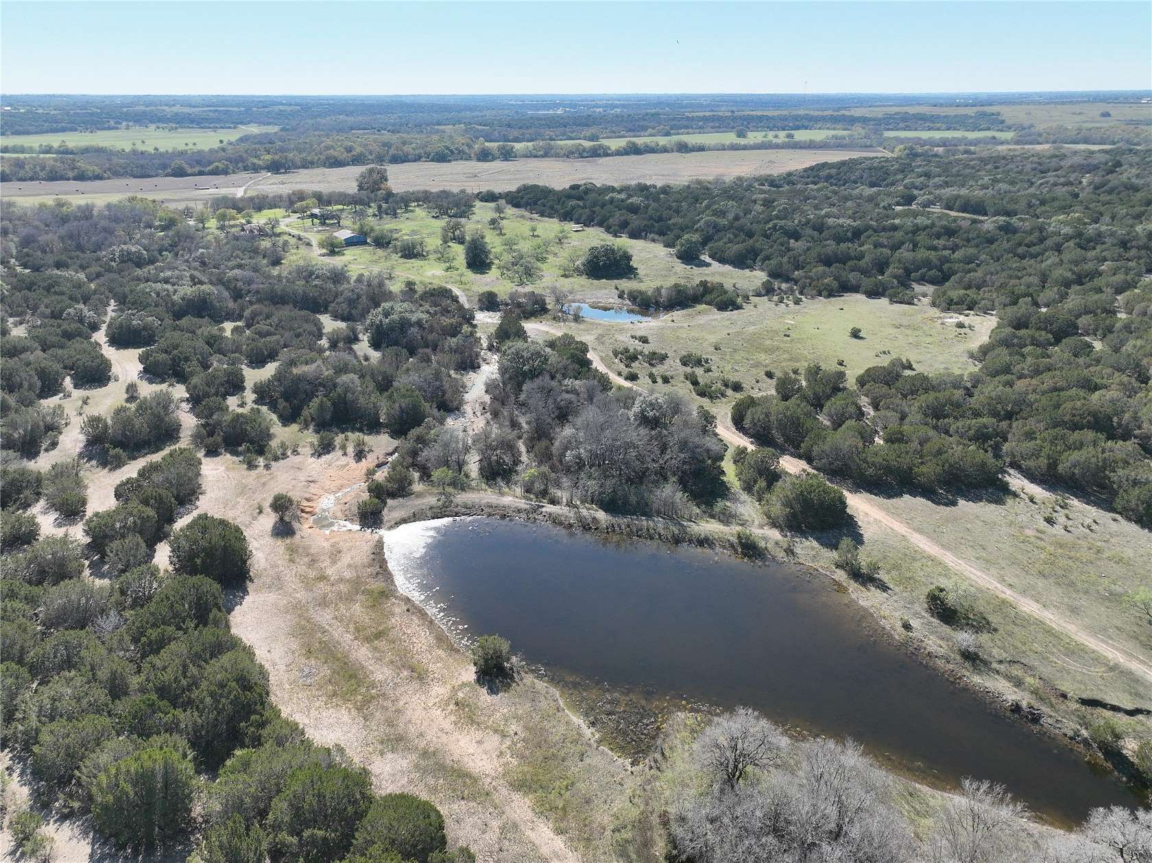 81.8 Acres of Recreational Land with Home for Sale in Hico, Texas
