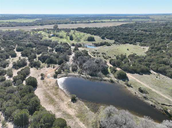 81.8 Acres of Recreational Land with Home for Sale in Hico, Texas