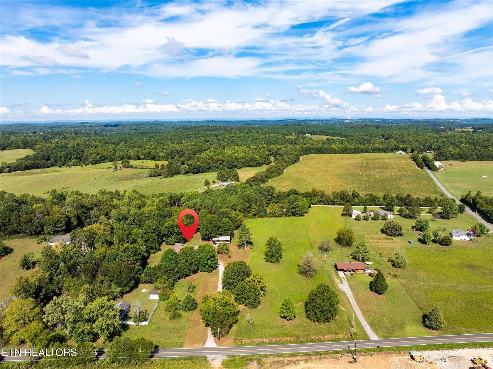 2.6 Acres of Land with Home for Sale in Riceville, Tennessee