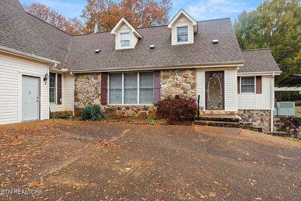 2.6 Acres of Residential Land with Home for Sale in Riceville, Tennessee