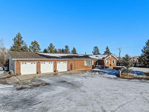 8 Acres of Residential Land with Home for Sale in Williston, North Dakota