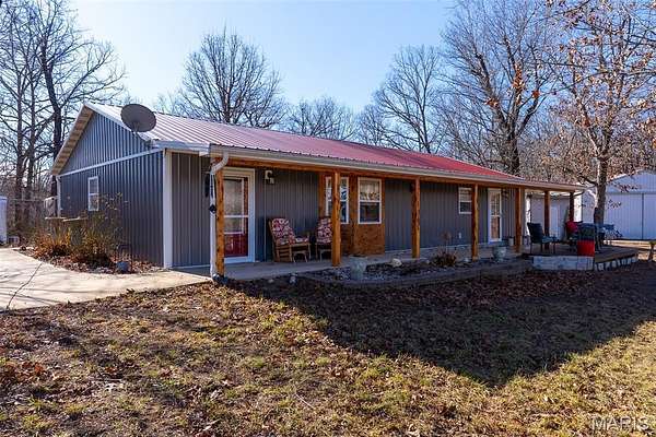 76 Acres of Land with Home for Sale in Cook Station, Missouri
