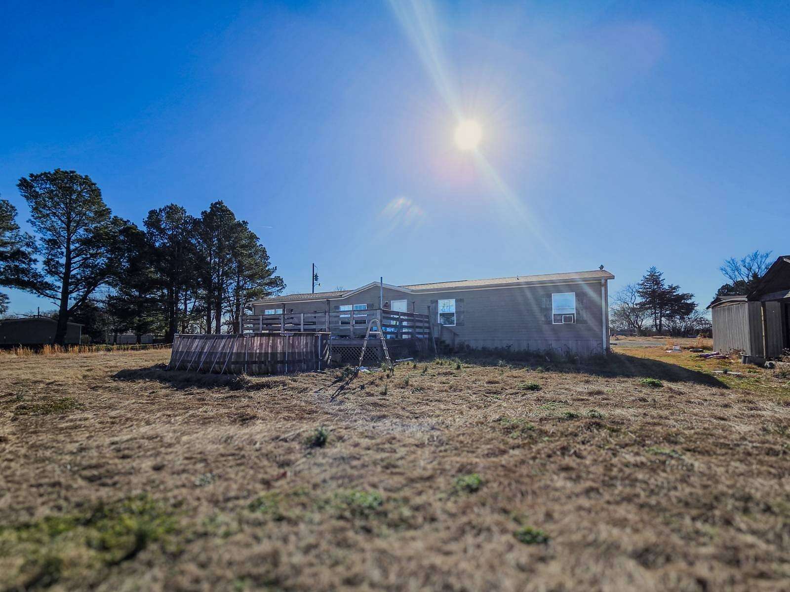 5 Acres of Residential Land with Home for Sale in Spiro, Oklahoma