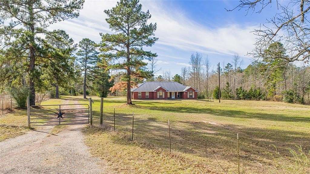 7.69 Acres of Land with Home for Sale in Henderson, Texas