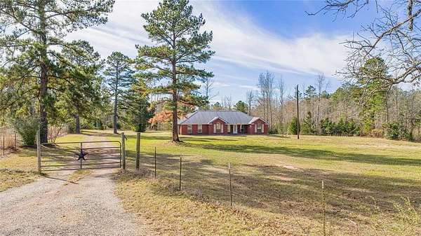 7.69 Acres of Land with Home for Sale in Henderson, Texas