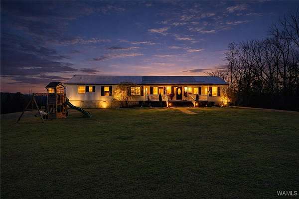 20.9 Acres of Land with Home for Sale in Duncanville, Alabama