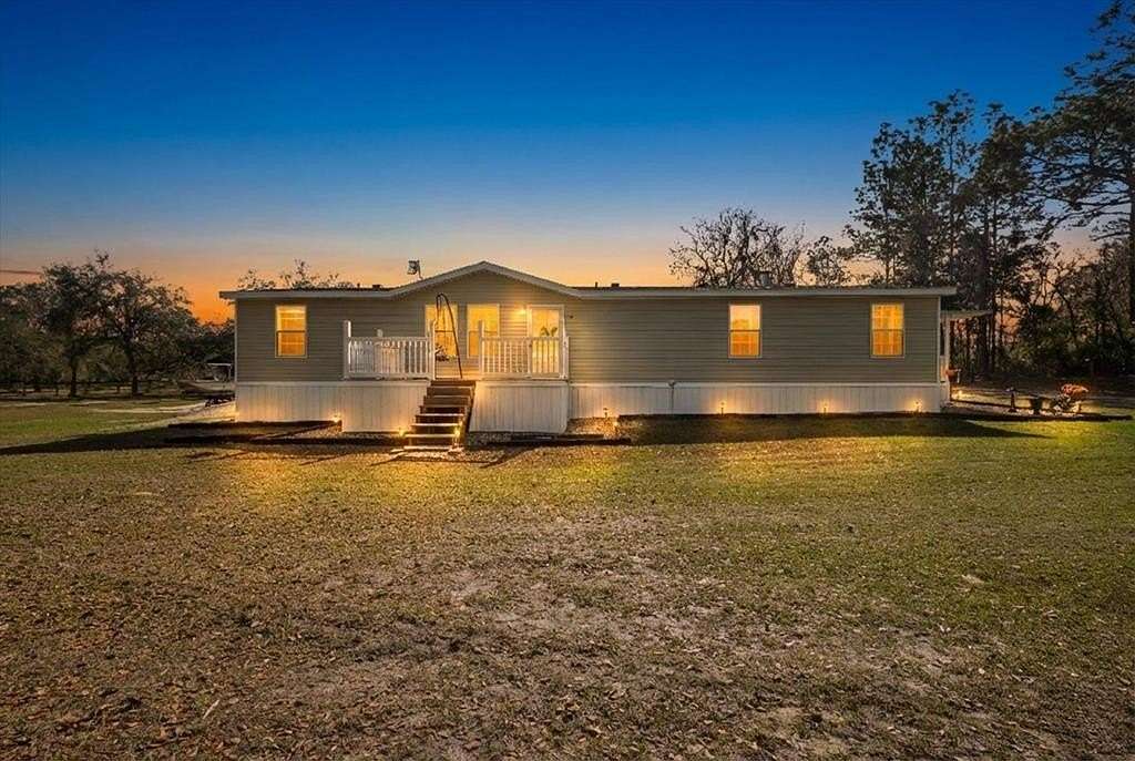 2.58 Acres of Residential Land with Home for Sale in Morriston, Florida