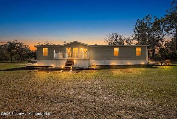 2.58 Acres of Residential Land with Home for Sale in Morriston, Florida