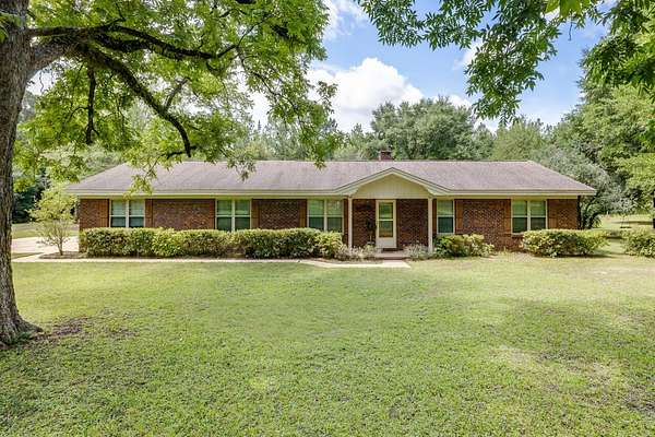 17.4 Acres of Land with Home for Sale in Baker, Florida