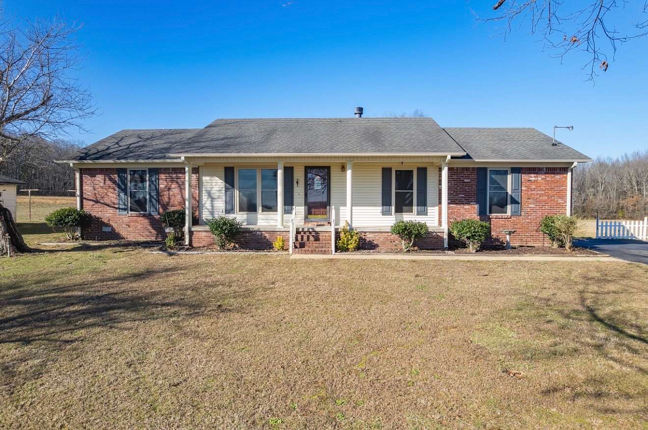 7.5 Acres of Residential Land with Home for Sale in Henderson, Tennessee