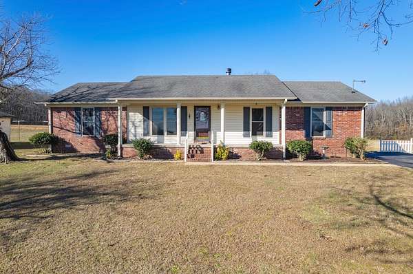 7.5 Acres of Residential Land with Home for Sale in Henderson, Tennessee