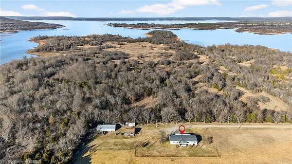 32.5 Acres of Agricultural Land with Home for Sale in Stigler, Oklahoma