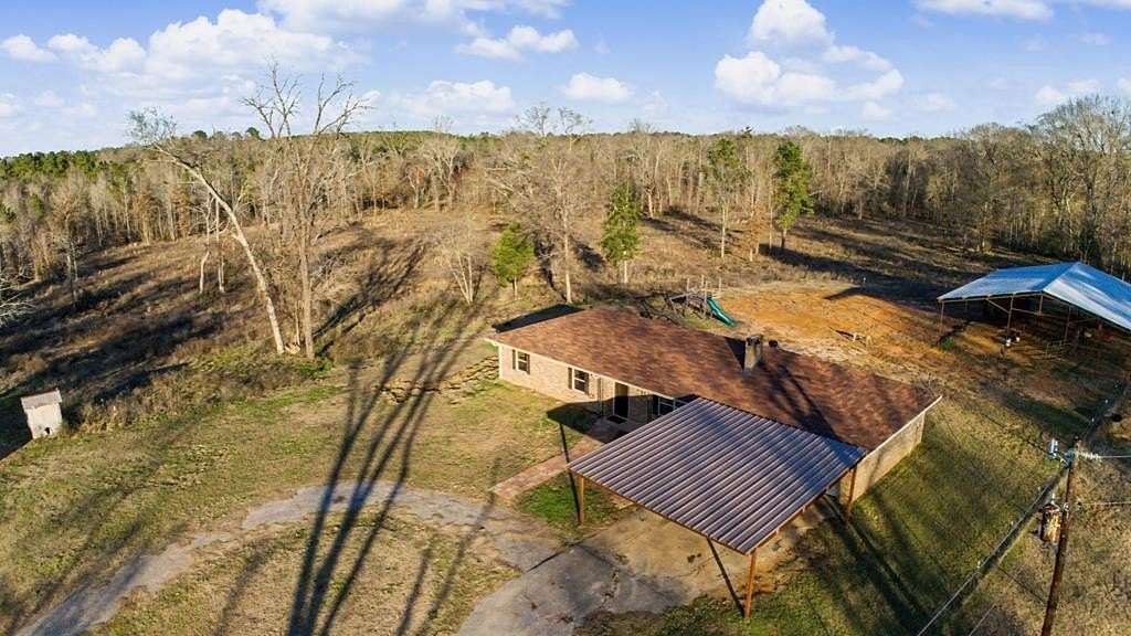 32 Acres of Land with Home for Sale in Mount Enterprise, Texas