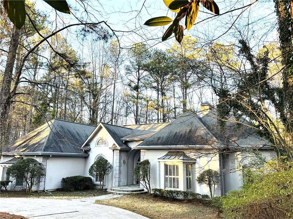 2.3 Acres of Residential Land with Home for Sale in Powder Springs, Georgia