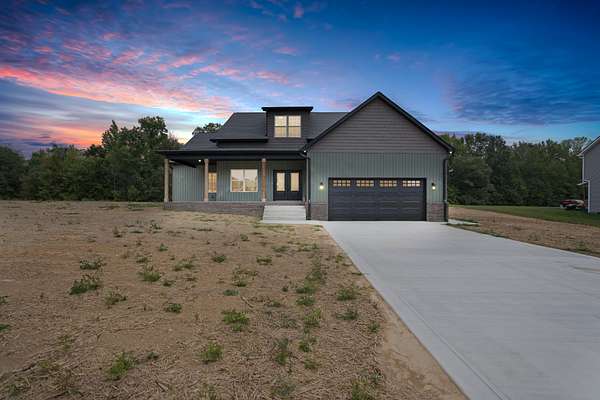 1.5 Acres of Residential Land with Home for Sale in Woodlawn, Tennessee