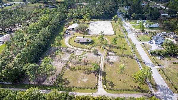 5.5 Acres of Land with Home for Sale in The Acreage, Florida