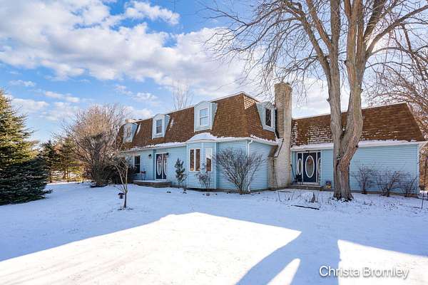 1.86 Acres of Residential Land with Home for Sale in Lowell, Michigan