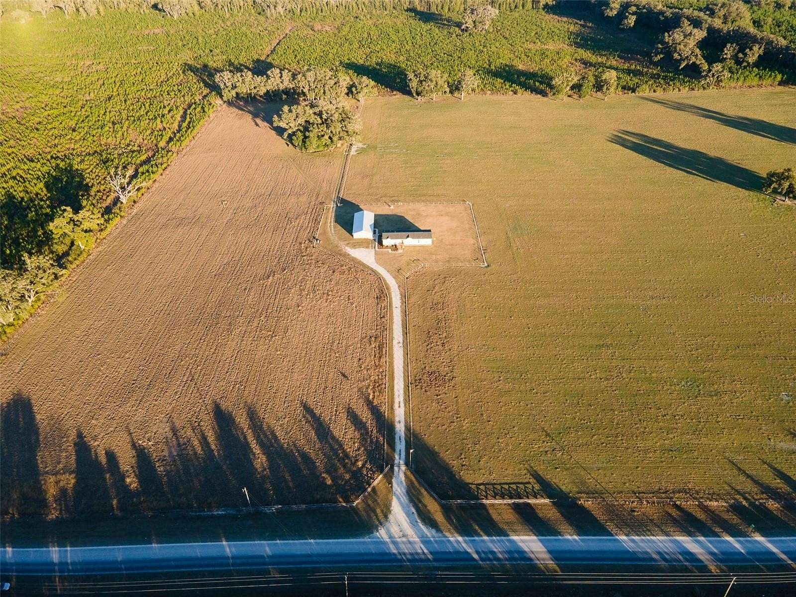 9.83 Acres of Land with Home for Sale in Newberry, Florida